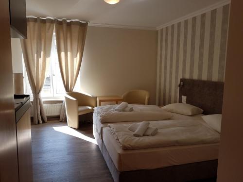 Imagen de la habitación del Hotel Zum Weissen Ross. Foto 9