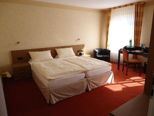Imagen de la habitación del Hotel Zum Wei&szlig;en Ro&szlig;. Foto 8