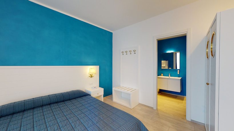 Imagen de la habitación del Hotel Zunino, Spotorno. Foto 10