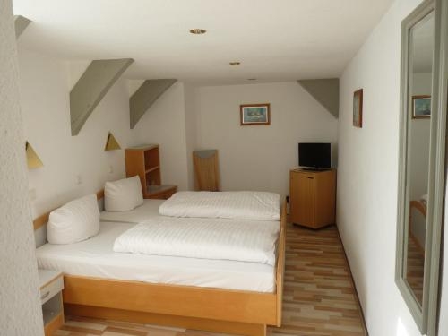 Imagen de la habitación del Hotel Zur Krone, Hamel&iacute;n. Foto 9