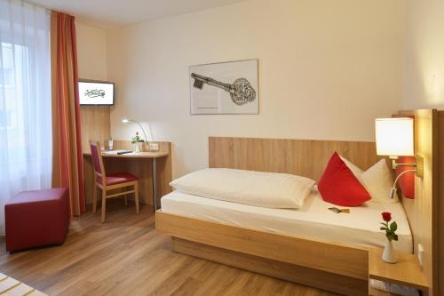 Imagen de la habitación del Hotel Zur Traube. Foto 9