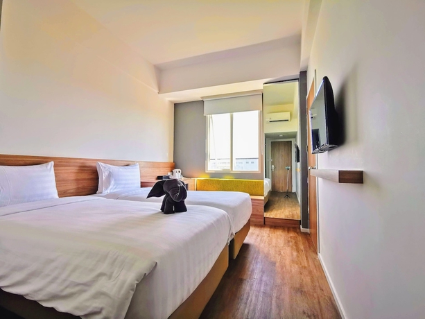Imagen de la habitación del Hotel Zuri Express Banjarmasin - Chse Certified. Foto 11