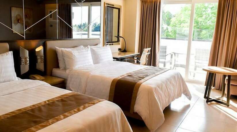 Imagen de la habitación del Hotel Zuri. Foto 13