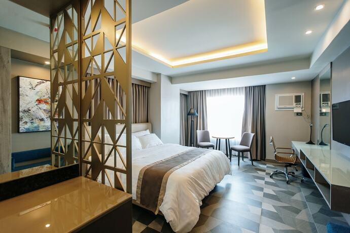 Imagen de la habitación del Hotel Zuri. Foto 18