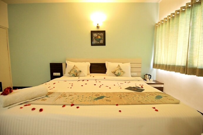 Imagen de la habitación del Hotel Zuzu Ashish Palace. Foto 18