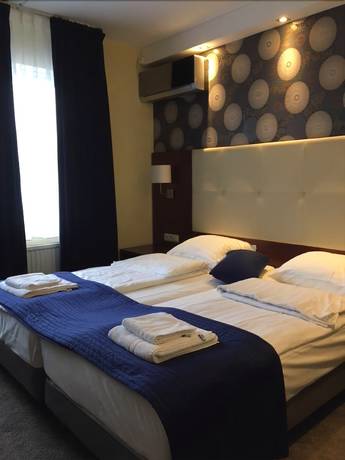 Imagen de la habitación del Hotel Zwanenburg. Foto 17