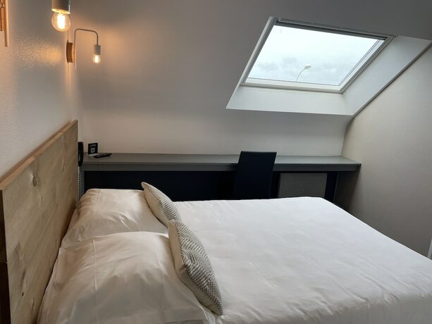 Imagen de la habitación del Hotel a Licorne. Foto 12