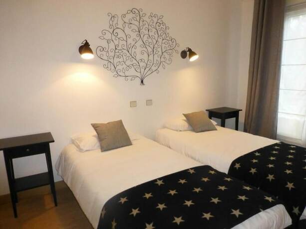 Imagen de la habitación del Hotel a Licorne. Foto 13