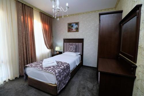 Imagen de la habitación del Hotel aSa Boutique. Foto 16