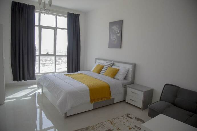Imagen de la habitación del Hotel al alkeem heights. Foto 14