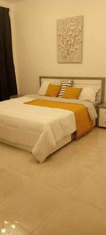Imagen de la habitación del Hotel al alkeem heights. Foto 15