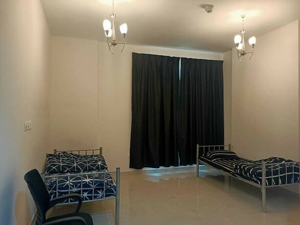 Imagen de la habitación del Hotel al alkeem heights. Foto 16