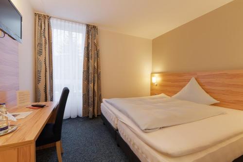 Imagen de la habitación del Hotel alfa hotel, Kirkel. Foto 6