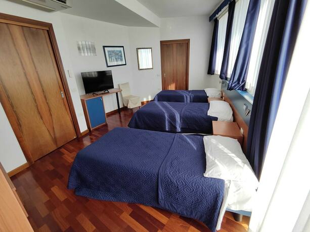 Imagen de la habitación del Hotel all\'Oasi. Foto 13