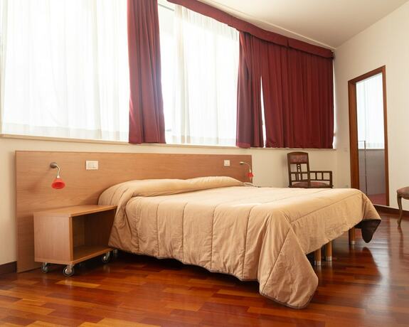 Imagen de la habitación del Hotel all\'Oasi. Foto 16