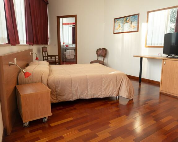 Imagen de la habitación del Hotel all\'Oasi. Foto 18