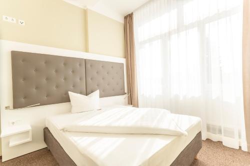 Imagen de la habitación del Hotel am Schlosspark, G&uuml;strow. Foto 15