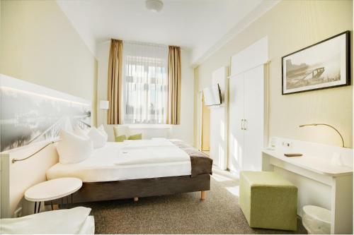 Imagen de la habitación del Hotel am Schlosspark, G&uuml;strow. Foto 17