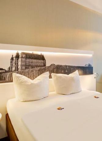 Imagen de la habitación del Hotel am Schlosspark, G&uuml;strow. Foto 19