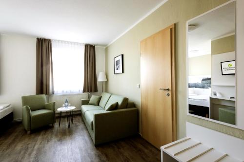 Imagen de la habitación del Hotel am Schlosspark, G&uuml;strow. Foto 20