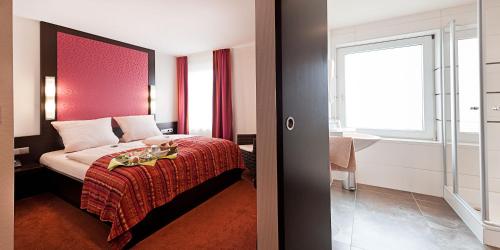 Imagen de la habitación del Hotel am Stadtring. Foto 4