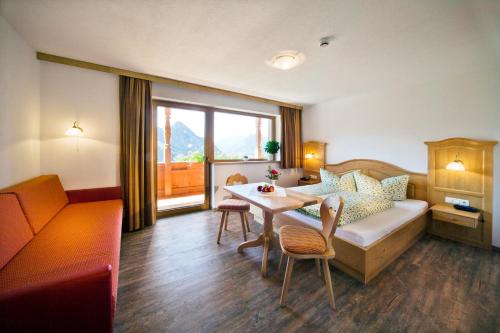 Imagen de la habitación del Hotel & Alpengasthof Pinzgerhof. Foto 6