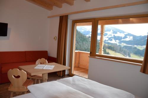 Imagen de la habitación del Hotel & Alpengasthof Pinzgerhof. Foto 10