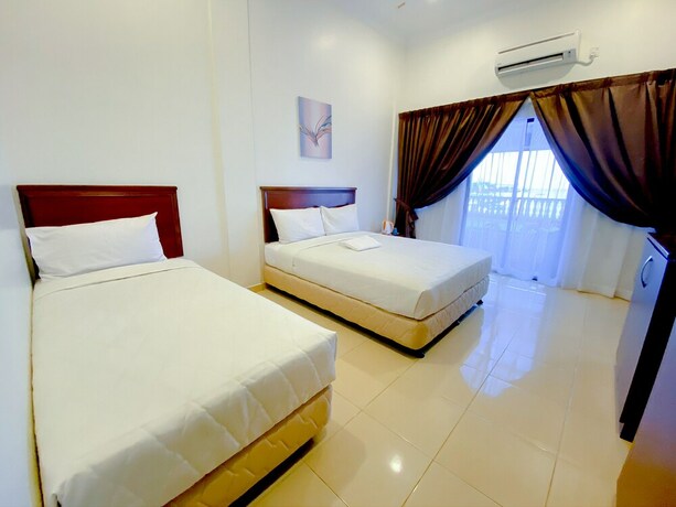 Imagen de la habitación del Hotel & Chalet Sportfishing Pnk Teluk Bahang. Foto 24