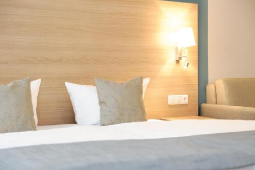 Imagen de la habitación del Hotel & Gasthaus DAS R&Ouml;HRL Straubing. Foto 4