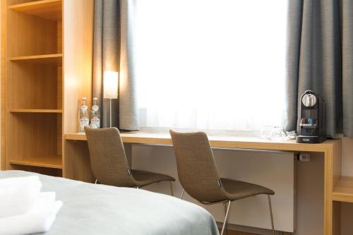 Imagen de la habitación del Hotel & Gasthaus DAS R&Ouml;HRL Straubing. Foto 7
