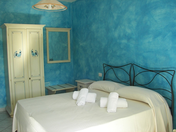 Imagen de la habitación del Hotel & Residence La Ciaccia. Foto 11