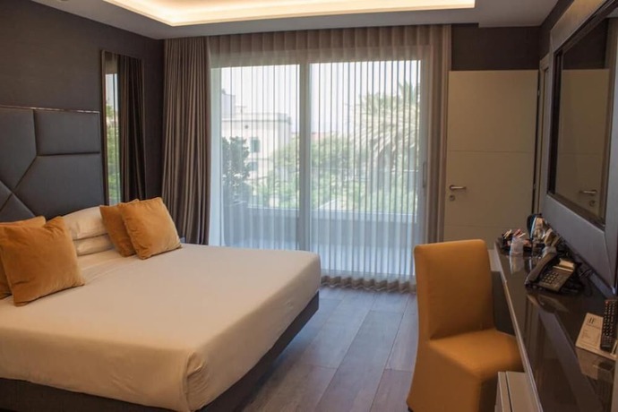 Imagen de la habitación del Hotel & Resort Tre Fontane Luxury. Foto 3