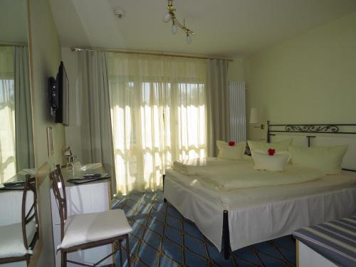 Imagen de la habitación del Hotel & Restaurant Mainaublick. Foto 9