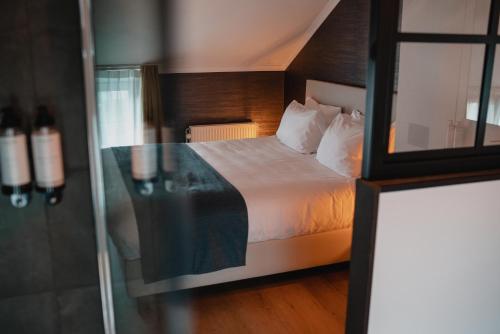 Imagen de la habitación del Hotel & Restaurant Maison Pal\'Ange. Foto 18