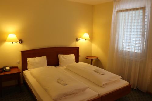 Imagen de la habitación del Hotel & Restaurant Reinacherhof. Foto 19