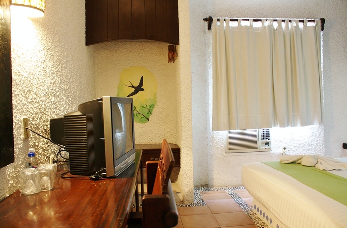 Imagen de la habitación del Hotel & Spa Xbalamque Cancún Centro. Foto 8