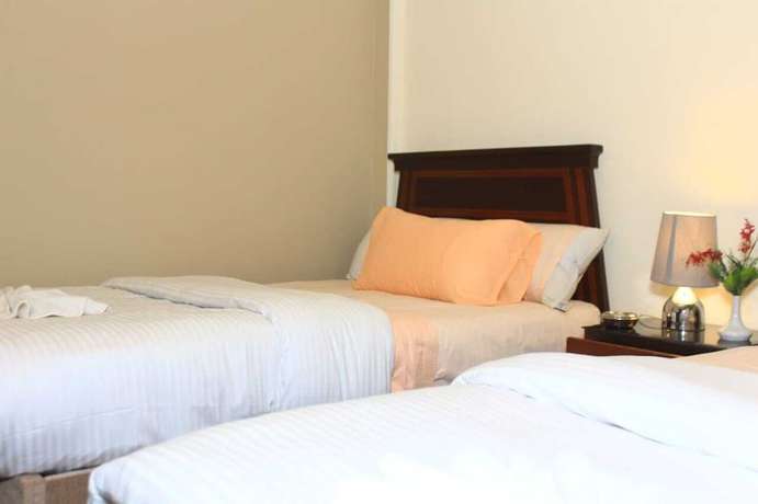 Imagen de la habitación del Hotel and Apartments Jewel Al Nasr. Foto 8