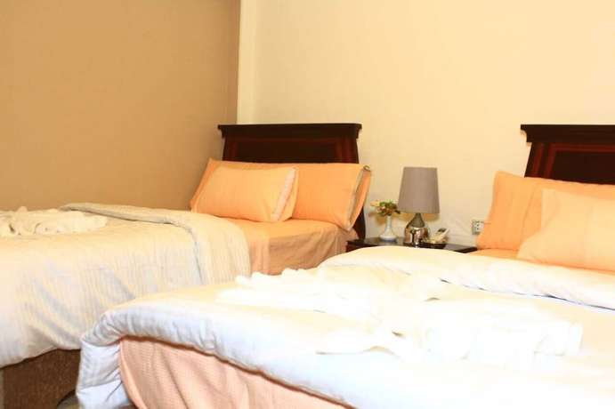 Imagen de la habitación del Hotel and Apartments Jewel Al Nasr. Foto 9