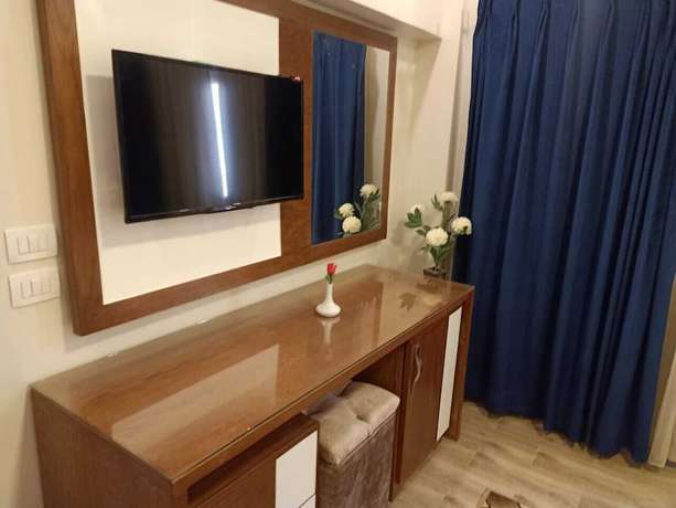 Imagen de la habitación del Hotel and Apartments Jewel Al Nasr. Foto 12