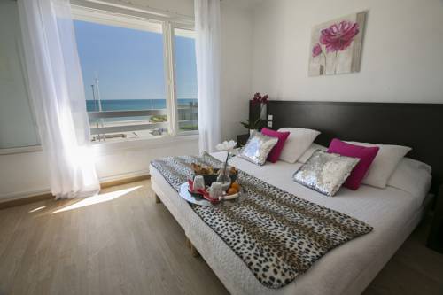 Imagen de la habitación del Hotel and Appartements Le Grand Large Bord De Mer. Foto 10