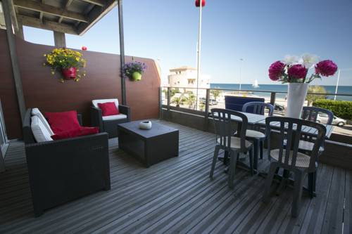 Imagen de la habitación del Hotel and Appartements Le Grand Large Bord De Mer. Foto 16