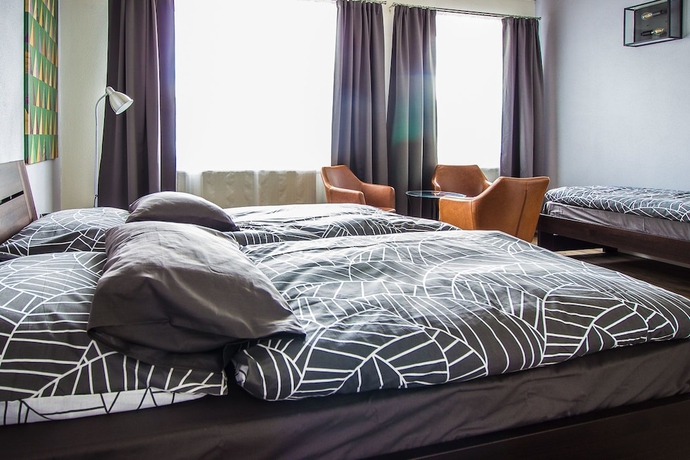 Imagen de la habitación del Hotel and Bistro 63. Foto 13