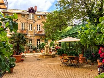 Imagen general del Hotel and Boardinghouse Garden Living. Foto 12