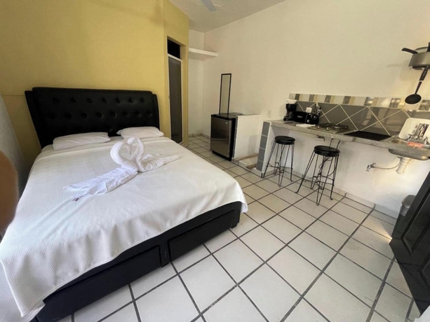 Imagen de la habitación del Hotel and Bungalows Palaces. Foto 2