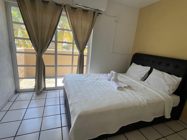Imagen de la habitación del Hotel and Bungalows Palaces. Foto 3