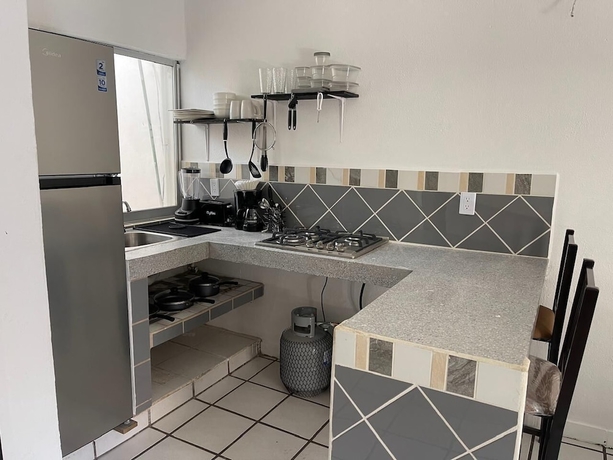 Imagen de la habitación del Hotel and Bungalows Palaces. Foto 8