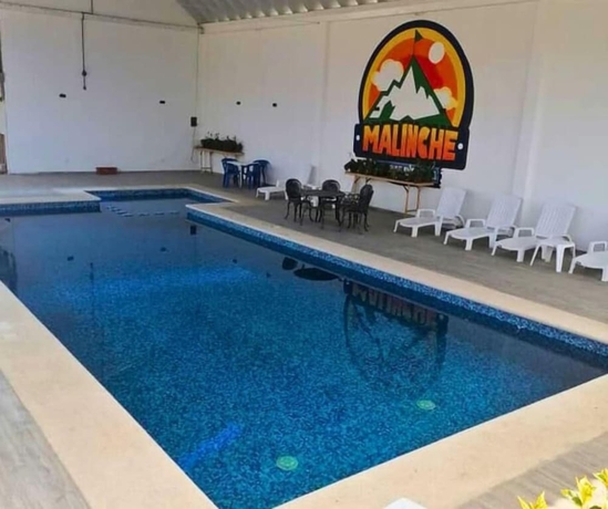 Imagen de la piscina del Hotel and Caba&ntilde;as Malinche. Foto 15