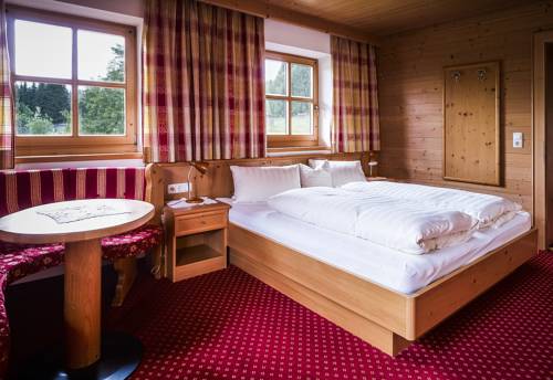 Imagen de la habitación del Hotel and Chalets Grosslehen. Foto 3