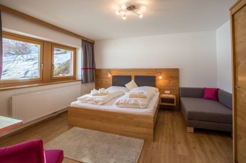 Imagen de la habitación del Hotel and Chalets Grosslehen. Foto 6