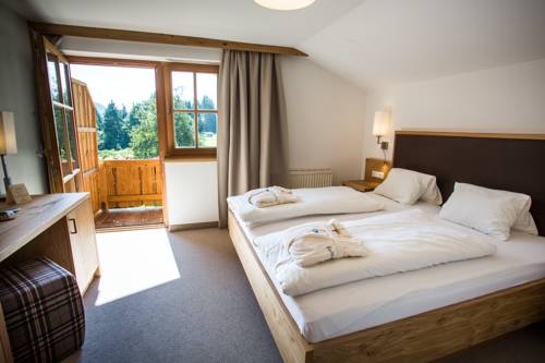 Imagen de la habitación del Hotel and Chalets Grosslehen. Foto 7